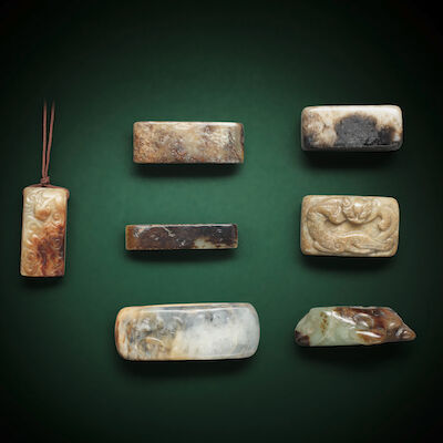 A GROUP OF SEVEN JADE SCABBARD SLIDES Probably Song Dynasty and later (7)