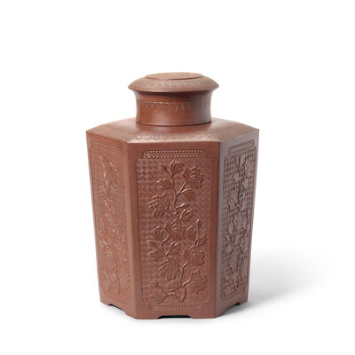 A LARGE YIXING STONEWARE HEXAGONAL 'PEONY' TEA CANISTER AND COVER 18th century (2)