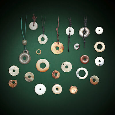 A GROUP OF JADE BI DISCS AND RINGS Neolithic period to Qing Dynasty (23)