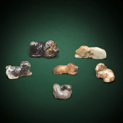 A GROUP OF SIX JADE RECUMBENT ANIMAL CARVINGS 19th/20th century (6)