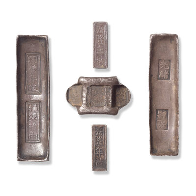 A GROUP OF FIVE CHINESE AND VIETNAMESE SILVER INGOTS Late 19th/early 20th century (5)