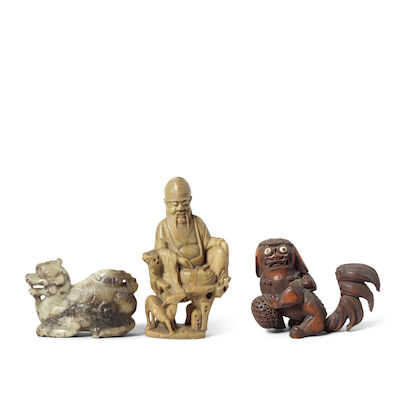 A CARVED BAMBOO 'BUDDHIST LION' GROUP, A SOAPSTONE CARVING OF SHOULAO AND A GREEN AND GREY JADE 'LUDUAN' CARVING 17th to 19th century (3)
