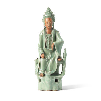 A LONGQUAN CELADON-GLAZED AND BISCUIT FIGURE OF GUANYIN Yuan/early Ming Dynasty, 14th-15th century