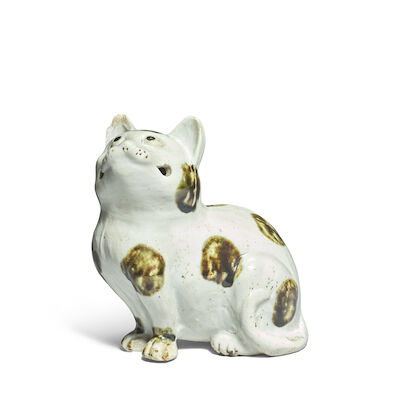 A BROWN-SPLASHED WHITE-GLAZED 'CAT' LANTERN Qing Dynasty
