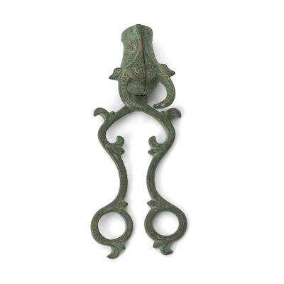 A pair of Khorasan bronze candle snuffers Persia, 12th/ 13th Century