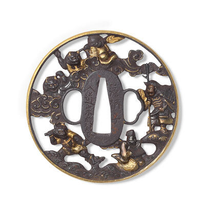 A ROUNDED IRON SOTEN TSUBA Late Edo period (3)