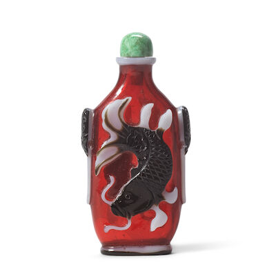 A BLACK AND WHITE DOUBLE OVERLAY RUBY-RED GLASS 'CARP' SNUFF BOTTLE Qing Dynasty, 1820-1880 (2)