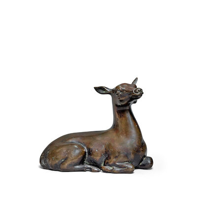 A BRONZE MODEL OF A RECUMBENT DOE 17th/18th century