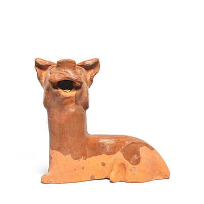 A BROWN-GLAZED RECUMBENT DOG Han Dynasty