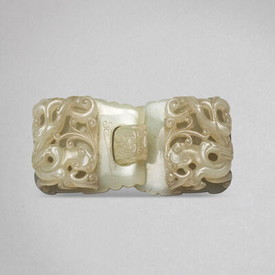 A CARVED WHITE JADE 'CHILONG' TWO-PART BELT BUCKLE 18th century (2)