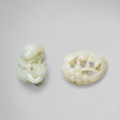 A WHITE JADE 'MONKEY' CARVING AND A WHITE JADE 'SQUIRREL AND GRAPE' CARVING Qing Dynasty (2)