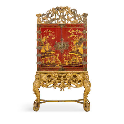 A William and Mary gilt brass mounted scarlet japanned cabinet on giltwood stand Circa 1690