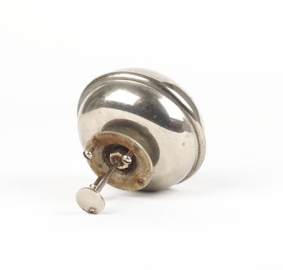 A foot operated underfloor warning bell, circa 1905