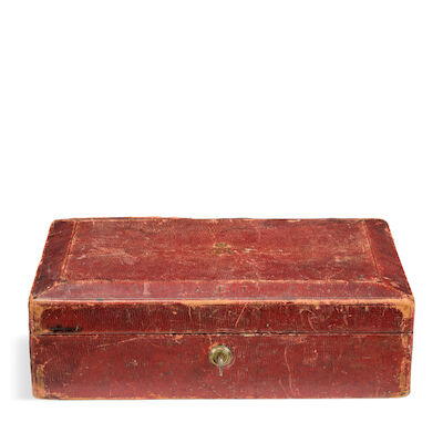 A George V red Moroccan leather despatch box bearing the insignia of King George V, believed to have belonged to Major Alan Reid Jamieson Made by John Peck and Son