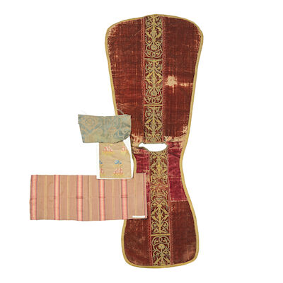 A chasuble of crimson velvet, with embroidered orphrey bands The orphrey bands Spanish or Italian, 16th century ((5))