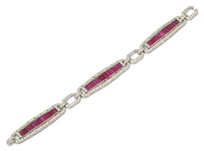 A ruby and diamond bracelet set with numerous rubies and diamonds, mounted in 18k white gold. L. 18.6 cm.