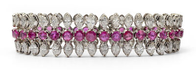 A ruby and diamond bracelet set with numerous rubies and diamonds, mounted in 18k white gold. L. 18.5 cm.