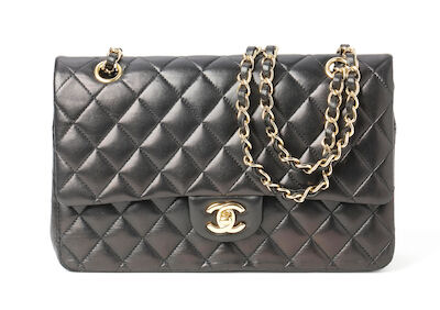 Chanel: A "Classic Double Flap" bag of black quilted leather with gold tone hardware. 2014.