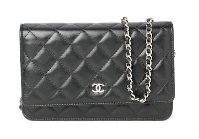 Chanel: A "Wallet on a chain" bag of black quilted leather with silver tone hardware. After 2021.