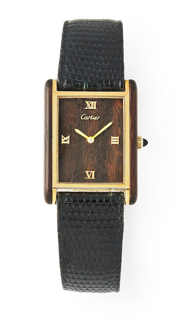 Cartier: Tank ''Palissandre de Rio'' of wood and gilt steel, ref. 2512. Mechanical movement with manual winding. 1970s.
