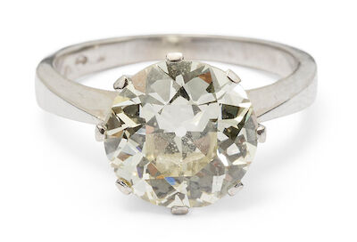 A solitaire diamond ring set with an old-cut diamond, mounted in 14k white gold. M/VS. Size 51.