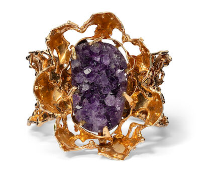 John Rørvig: An openable amethyst bangle set with a large amethyst crystal. Weight app. 97 g. L. app. 16.3 cm.