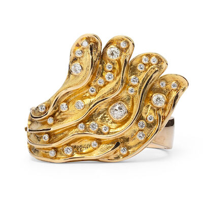 John Rørvig: An openable diamond bangle set with numerous diamonds, mounted in 14k gold. Inner diam. 5.8 cm.
