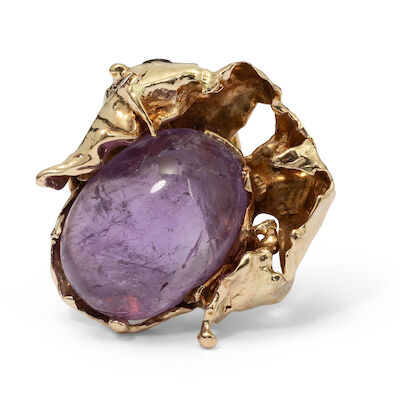 John Rørvig: An Amethyst ring set with a large cabochon-cut amethyst, mounted in 14k gold. W. 3.5 cm. Size 58.