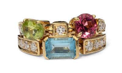 Bulgari: An "Allegra" ring set with tourmaline, peridote, topaz and numerous diamonds, mounted in 18k gold. Size 50.