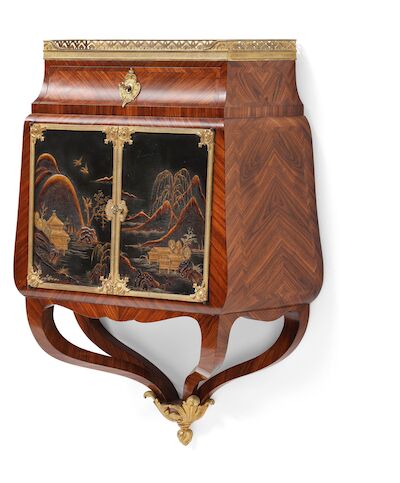 A French Régence style rosewood, gilt bronze and Japaneese laquer wall cabinet console. Mid-19th century. H. 72 cm. W. 57 cm. D. 23 cm.