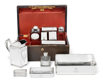 Nicholls & Plincke, retailers: Russian silver and glass travelling set, twelve pieces. St. Petersburg 1858. (13)