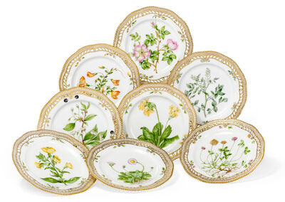 "Flora Danica" eight enamelled and gilt porcelain plates with pierced rim. Royal Copenhagen. 1894-1922. (8)