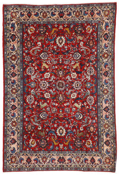 A Tehran carpet, Persia. All over design of palmettes, rosettes, foliage and animal motifs. Several areas with silk pile. C. 1930. 306 x 209 cm.
