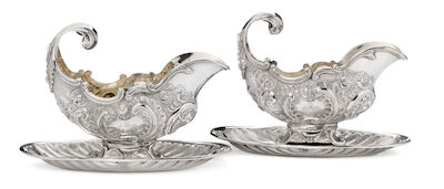 A. Michelsen: Two identical Danish Rococo Revival silver sauce boats in silver. Cph. 1884-1885. H. 16.5 cm. (2)