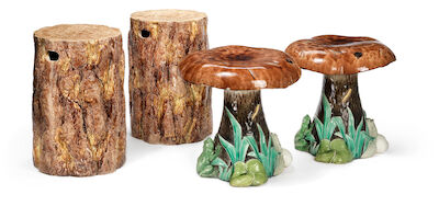 Gustavsbergs Porcelænsfabrik: Four garden stools of faience in the form of two mushrooms and two tree stumps. Circa 1900. (4)