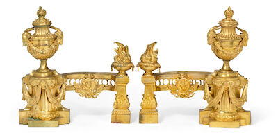 A pair of Napoleon III gilt bronze fire dogs. Late 19th century. H. 40 cm. W. 37 cm. (2)