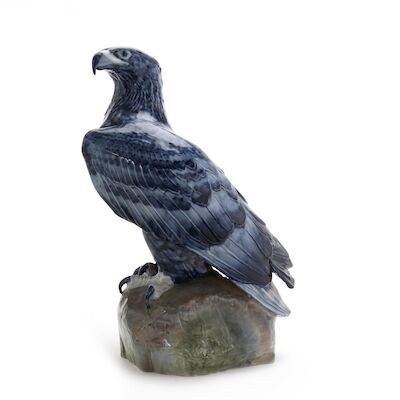 Vilhelm Th. Fischer: Golden eagle, seated on a rock, porcelain figure decorated in colours. Signed Vilh. Th. Fischer. Royal Copenhagen. 2033. H. 53 cm.