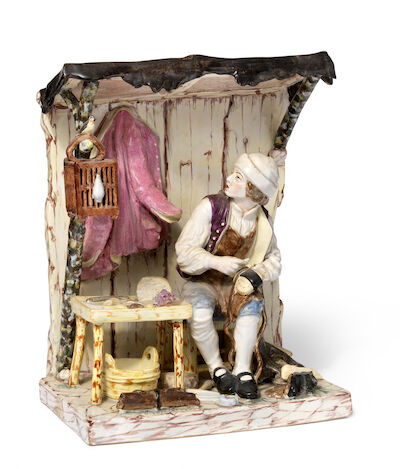 Paul Hannong?: A shoemaker. Faience figure. Strasbourg, mid-18th century. H. 23 cm L. 19 cm D. 12 cm.
