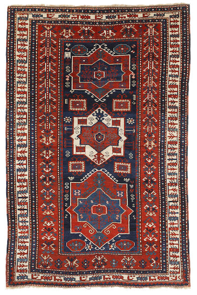 A dated tribal Kasak rug, Caucaus. Design with three geometrical medallions. Dated 131?=1890´s. 166 x 253 cm.
