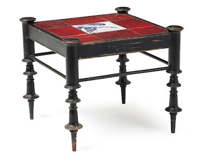 Kay Fisker, Jens Thirslund: A black-lacquered wood stool/side table with profiled rail. H. 41 cm. A black-lacquered wood stool/side table with profiled rail. Mounted on turned, tapered legs with round, horizontal stretchers. Seat mounted with nine lustre-glazed earthenware tiles, center tile decorat