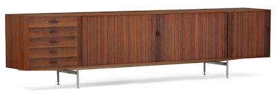 Ejner Larsen, Aksel Bender Madsen: Freestanding Brazilian rosewood sideboard mounted on round chromed steel legs. Freestanding Brazilian rosewood sideboard mounted on round chromed steel legs. Front with five drawers and three tambour doors behind which maple interior with shelves and trays. Model 2