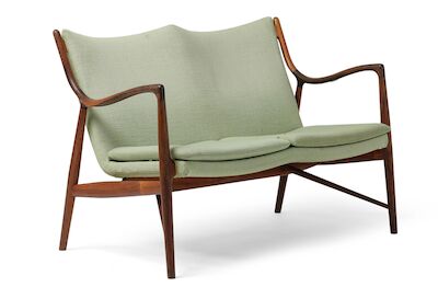 Finn Juhl: "FJ 45". Freestanding Brazilian rosewood two seater sofa. Seat, back and loose cushions upholstered with green wool. "FJ 45". Freestanding Brazilian rosewood two seater sofa. Seat, back and loose cushions upholstered with green wool. Designed 1945. Made and stamped by cabinetmaker Niels V