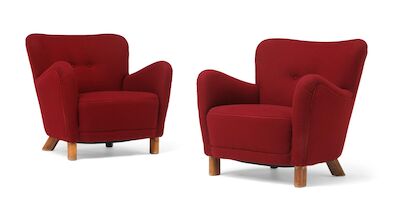 Fritz Hansen: A pair of easy chairs with oval, stained beech legs. Upholstered with bordeaux wool. (2) A pair of easy chairs with oval, stained beech legs. Seat, sides and back upholstered with bordeaux wool, back fitted with buttons. Model 1669. These examples manufactured 1940s by Fritz Hansen. (2