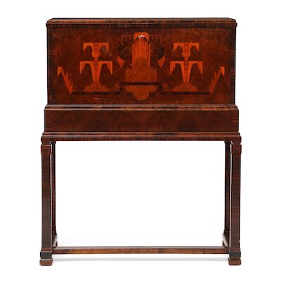 Swedish Grace: Mixed woods cocktail cabinet with intarsia. Sweden, 1920s-1930s. H. 127 cm. Swedish Grace cocktail cabinet in mixed woods with intarsia featuring grape clusters and stylized flowers. The interior with a mirror flanked by two small cabinets. Front with flip-down leaf, interiour lined w