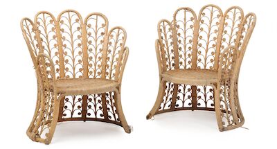 Nanna Ditzel: A pair of woven rattan chairs. Sides and back with curved and twisted volute details. (2) A pair of woven rattan chairs. Sides and back with curved and twisted volute details. Designed 1952. Manufactured by Fennkong in 1973. (2)