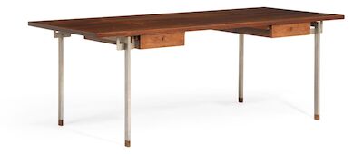 Hans J. Wegner: "AT 325". Freestanding Brazilian rosewood desk with chromed steel frame and rosewood "shoes". Front with two drawers. "AT 325". Freestanding Brazilian rosewood desk with chromed steel frame and rosewood "shoes". Front with two drawers. Designed 1961. This example manufactured 1960-70