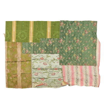 A panel of olive green silk brocade, together with silk brocade fragment and a group of brocade and jacquard panels Probably French, 18th century and later ((6))