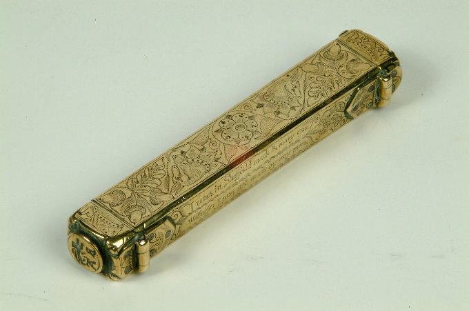 A mid 17th century brass pocket seal box,  13cm long.