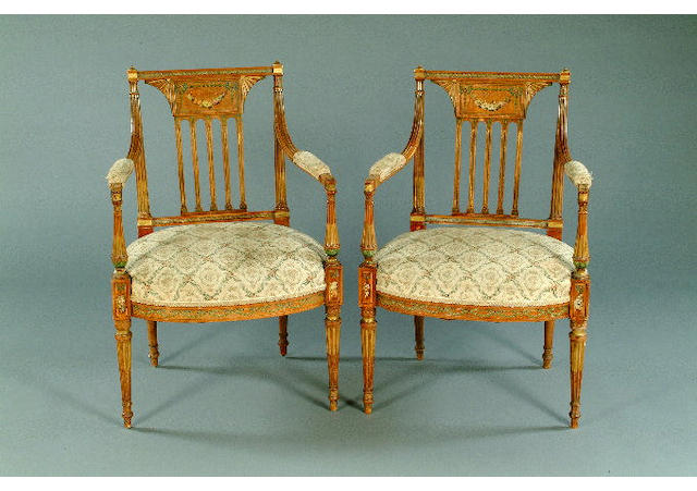 A pair of Edwardian painted satinwood open arm elbow chairs,