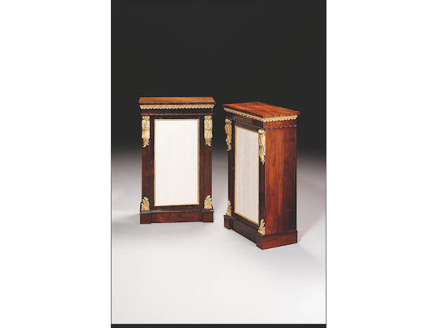 A pair of Regency rosewood and parcel gilt Pier Cabinets,